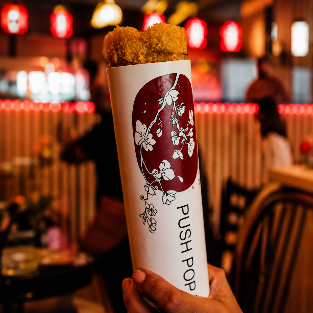Push Pop Sushi en mano